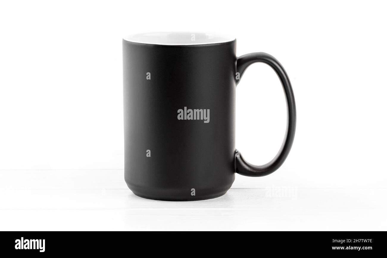 Black ceramic cup with white inside Stock Photo