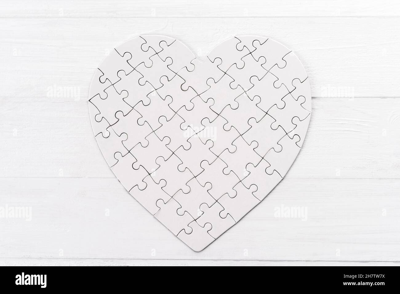 Heart shaped jigsaw puzzle Stock Photo