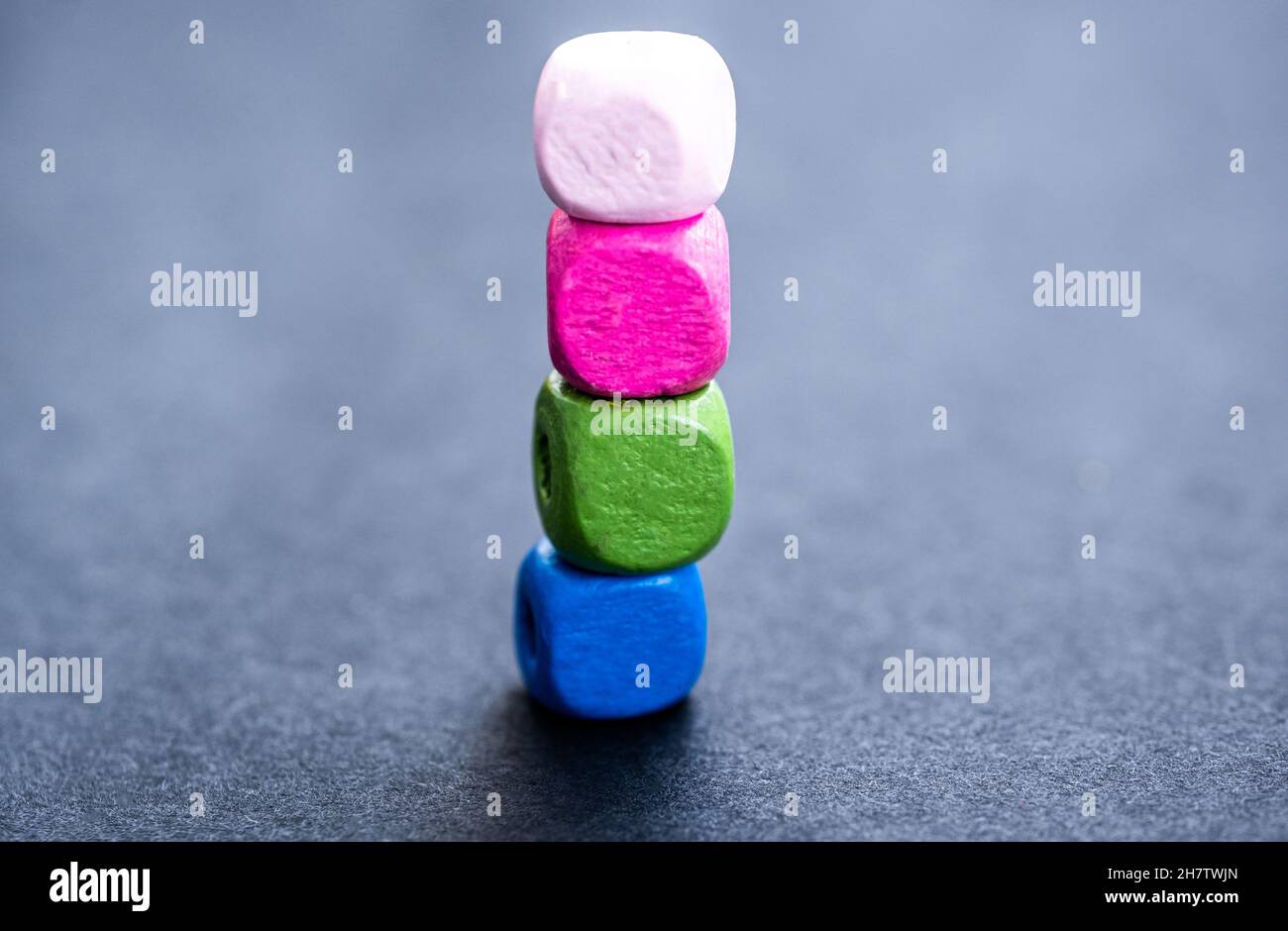 Stack of bright wooden beads Stock Photo