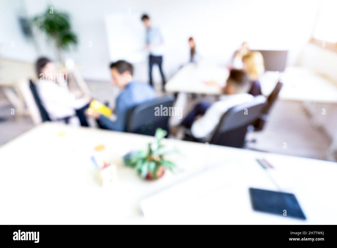 Blurred defocused background of businesspeople meeting with concentrated start up entrepreneur coworkers - Business concept with young people team Stock Photo
