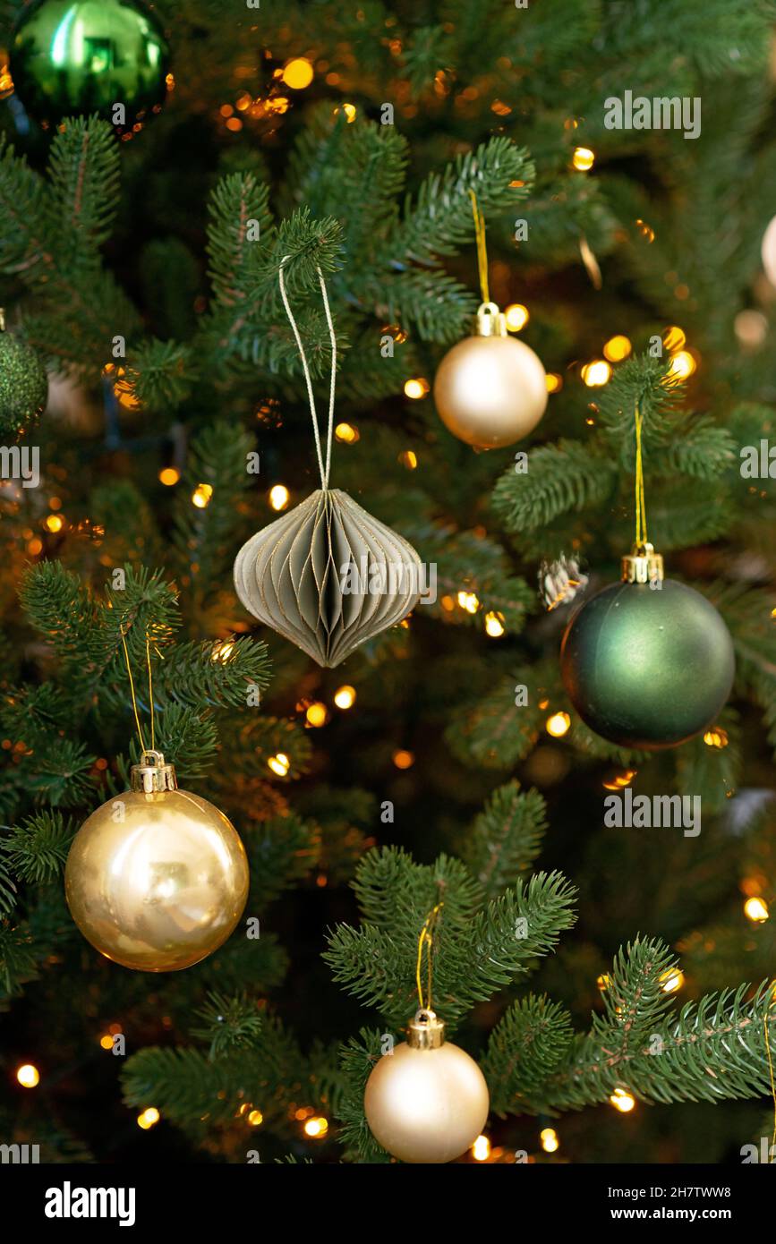 New year background. Christmas tree and Christmas lights and decorations. Soft selective focus. Stock Photo