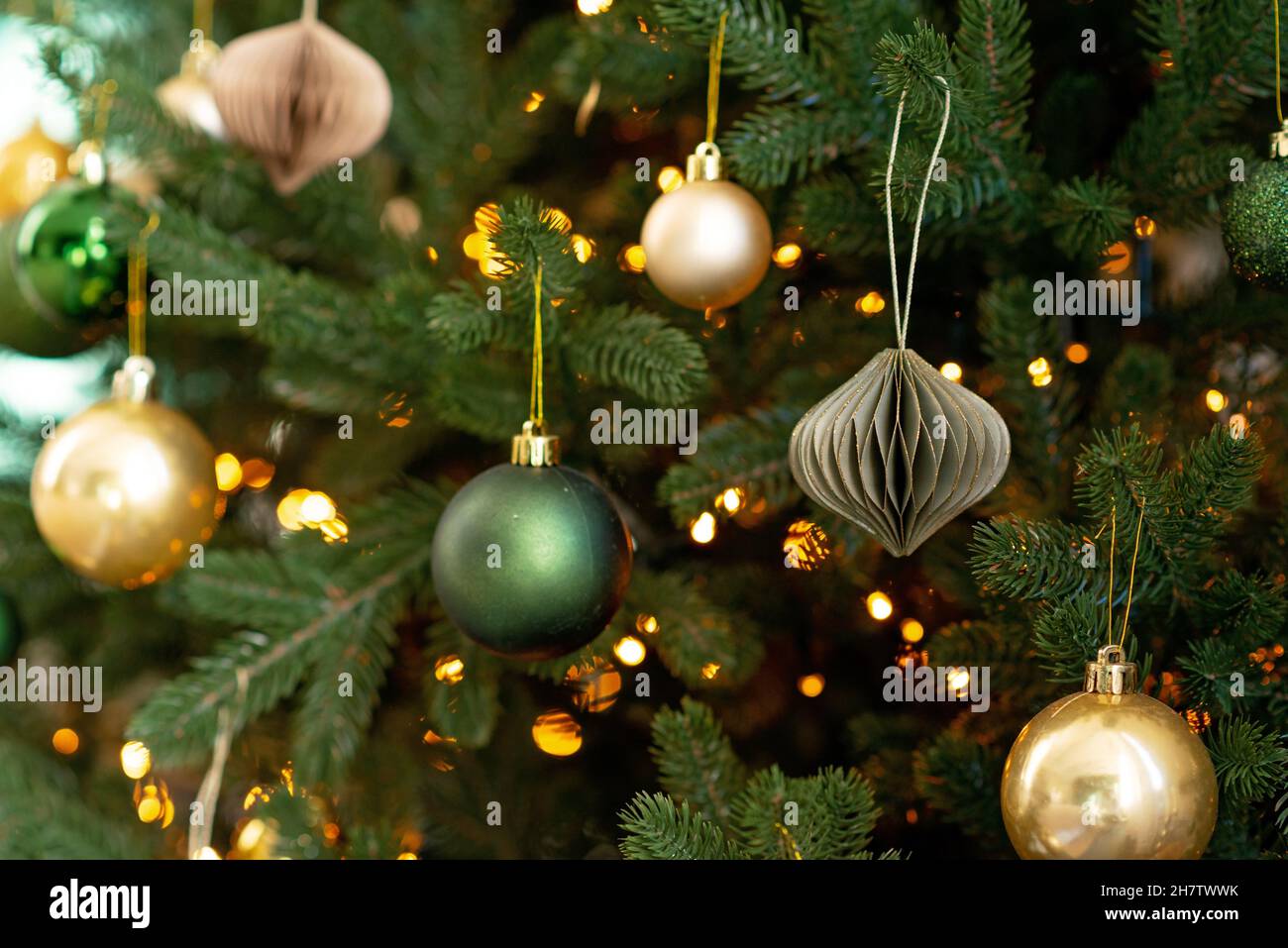 New year background. Christmas tree and Christmas lights and decorations. Soft selective focus. Stock Photo