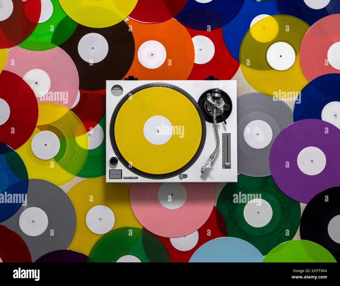 DJ turntables with different coloured records  Stock Photo