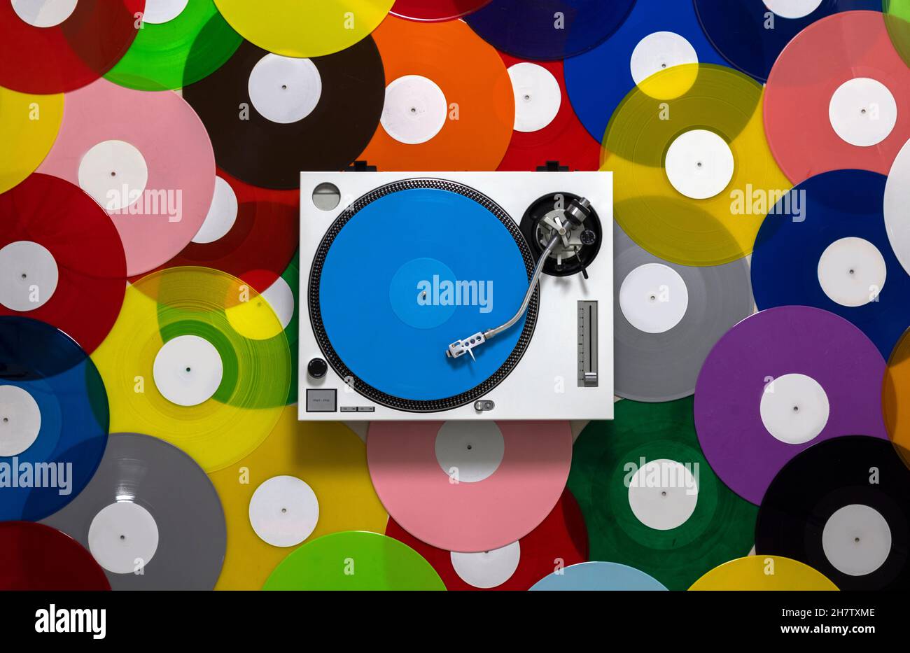 DJ turntables with different coloured records  Stock Photo