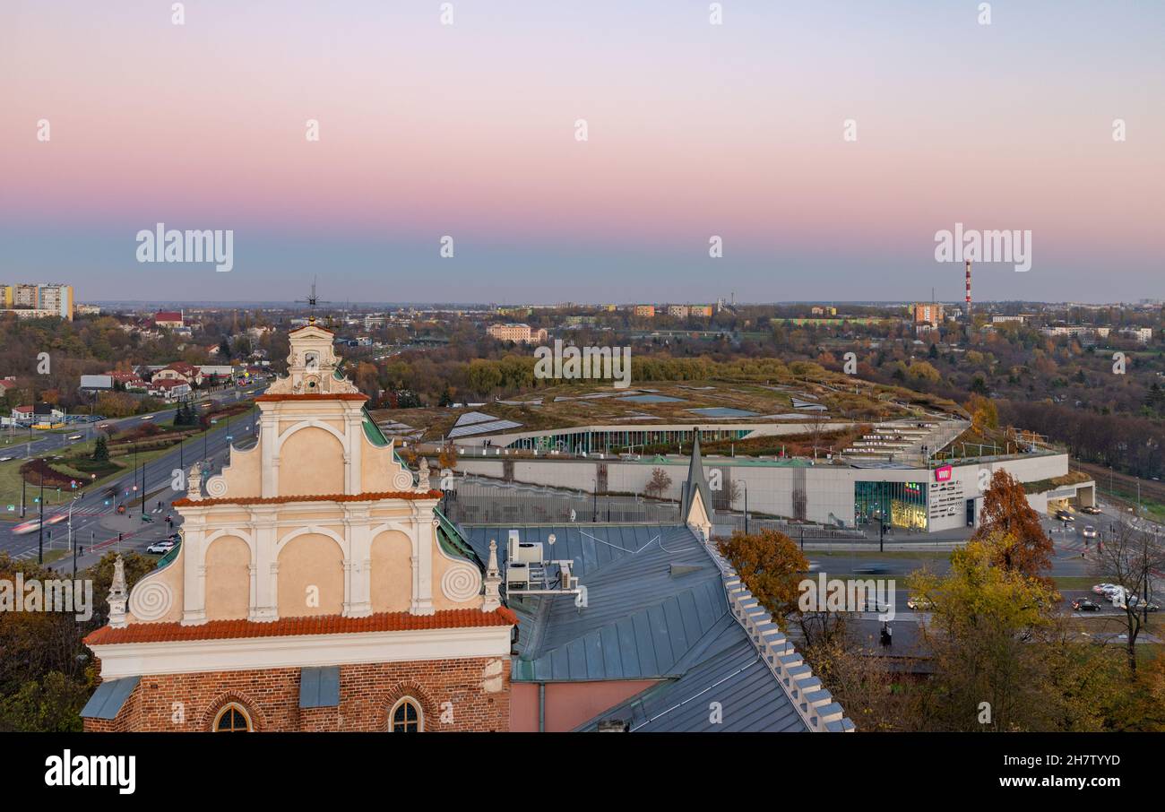 A picture of the Chapel of the Holy Trinity and the VIVO! Lublin Shopping Center. Stock Photo