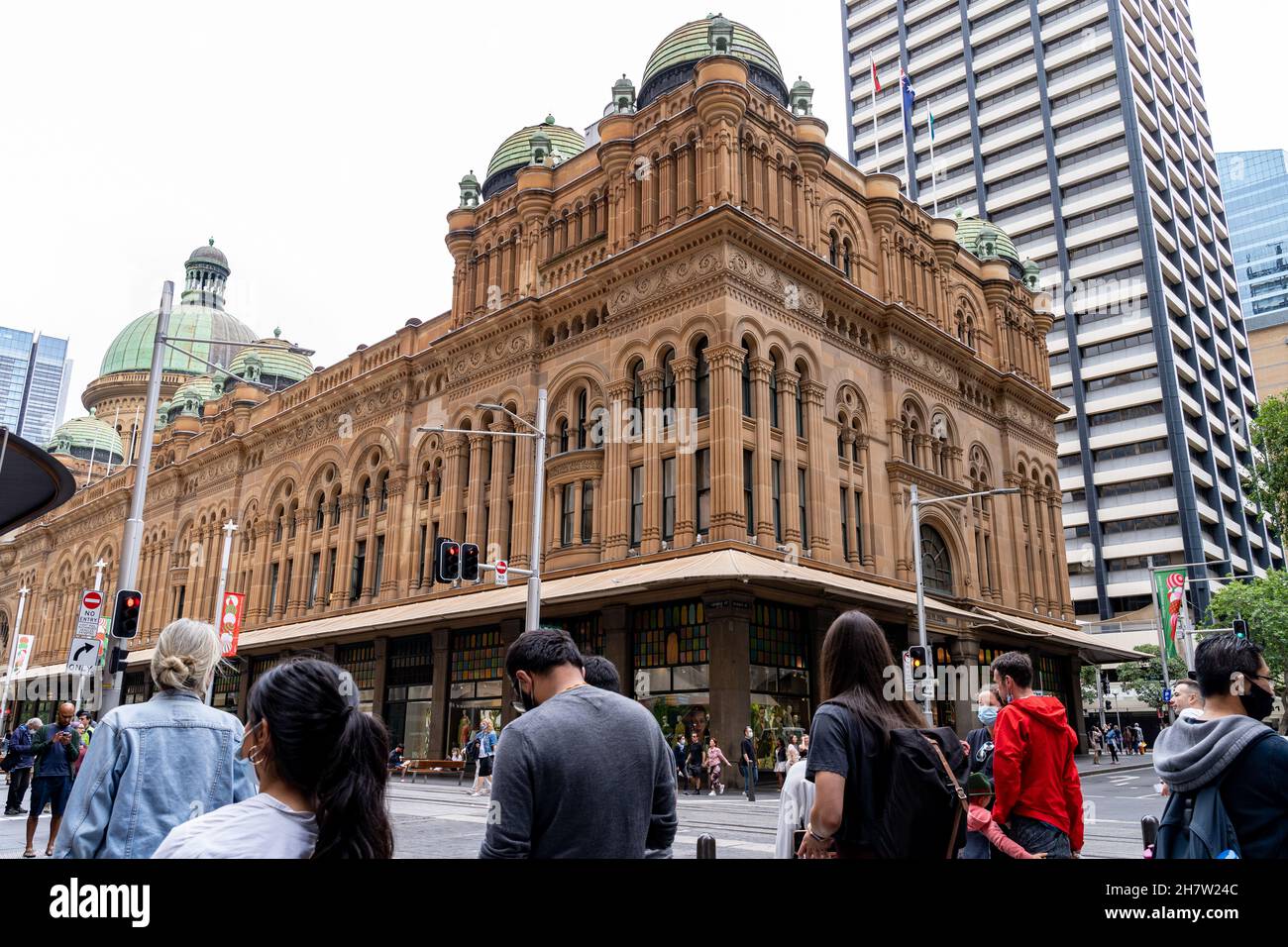 Busy city scene of hundreds of people near large buildings in Australia, Sydney. Stock Photo