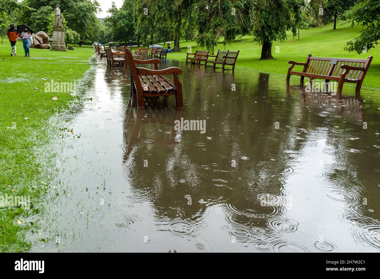 Edinburgh suffers heavy rainfall with flooding in West Princess street ...