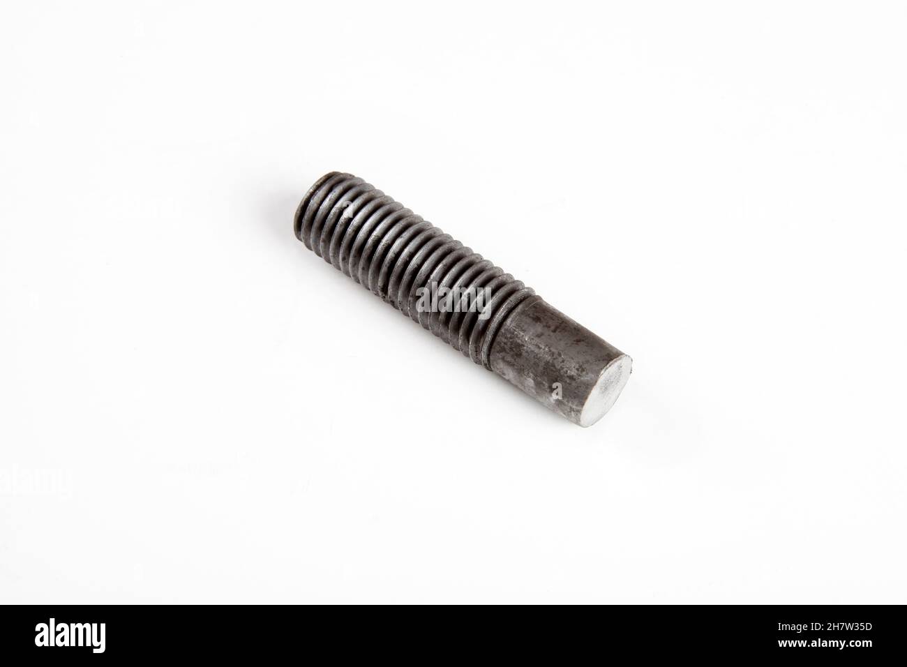 big metal screw on a white background Stock Photo Alamy