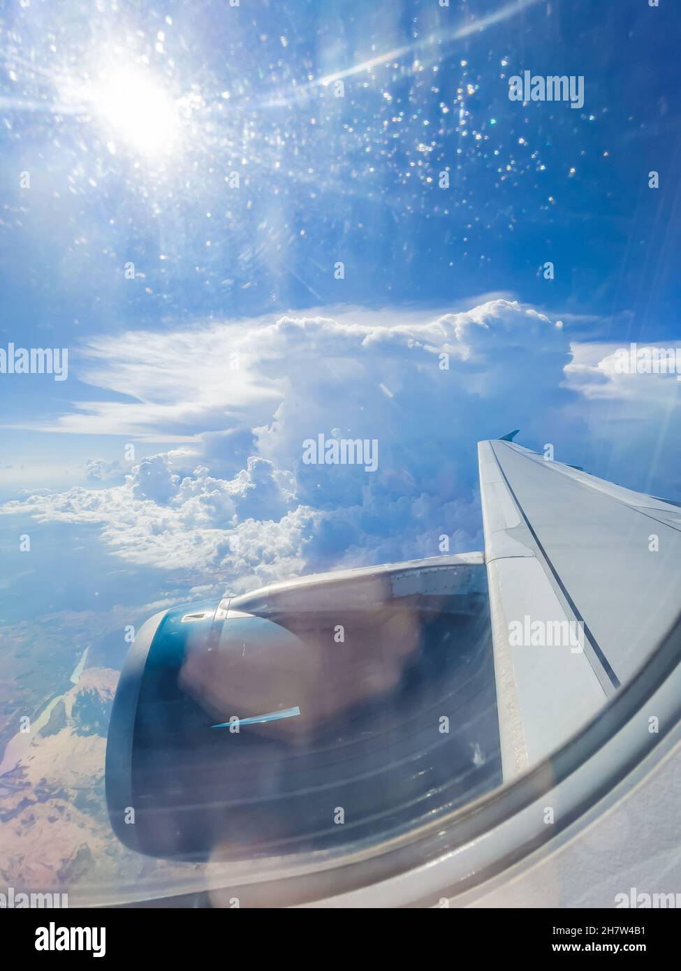 flying above the clouds. view from the airplane Stock Photo - Alamy