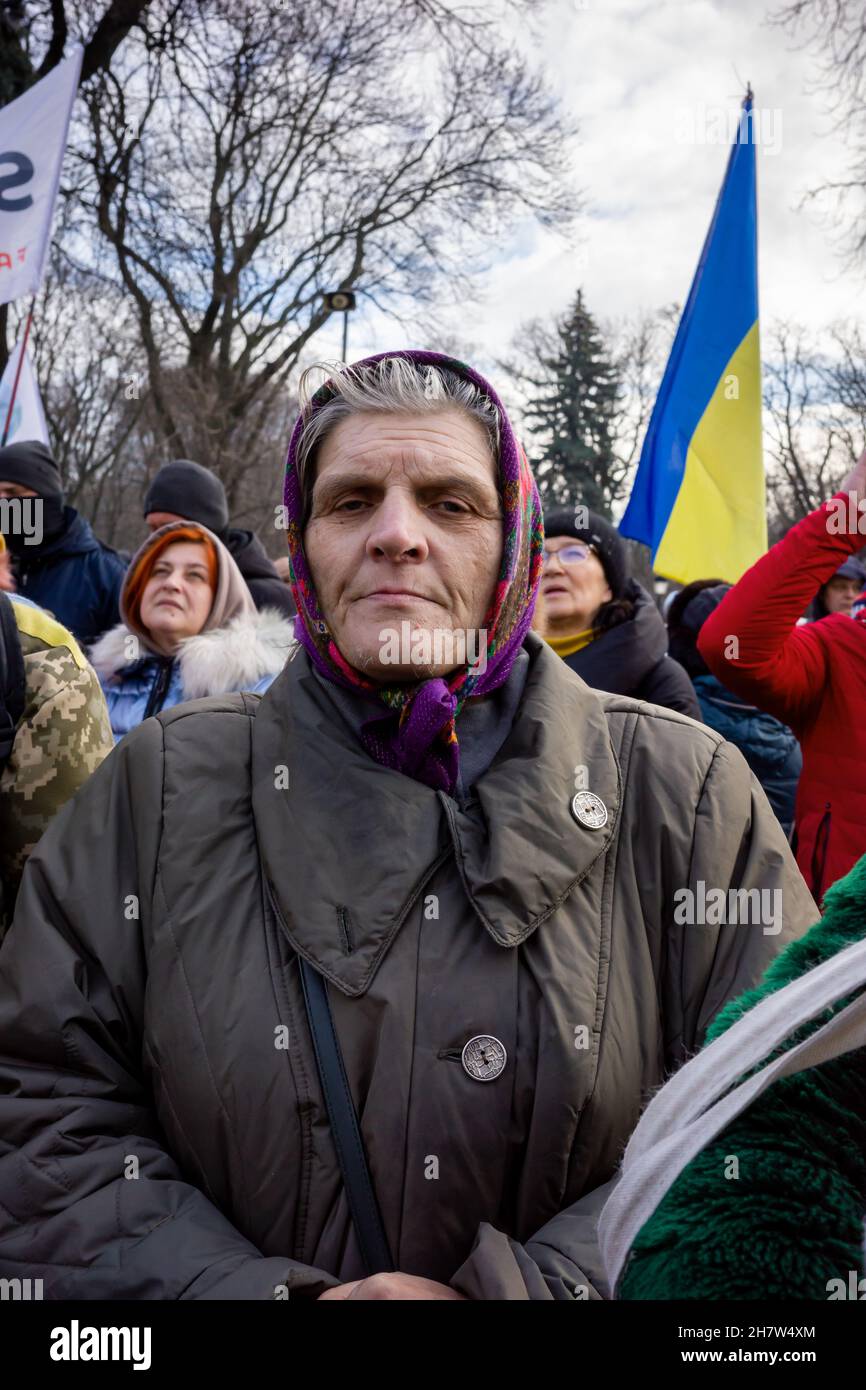 KYIV, UKRAINE - Nov. 24, 2021: Several hundred people protest against coronavirus restrictions and mandatory vaccinations. Stock Photo