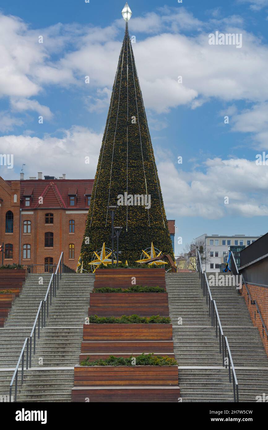 GDANSK, POLAND - 2020 JANUARY 19. Tall christmas tree next to the stairs in Gdansk city. Stock Photo