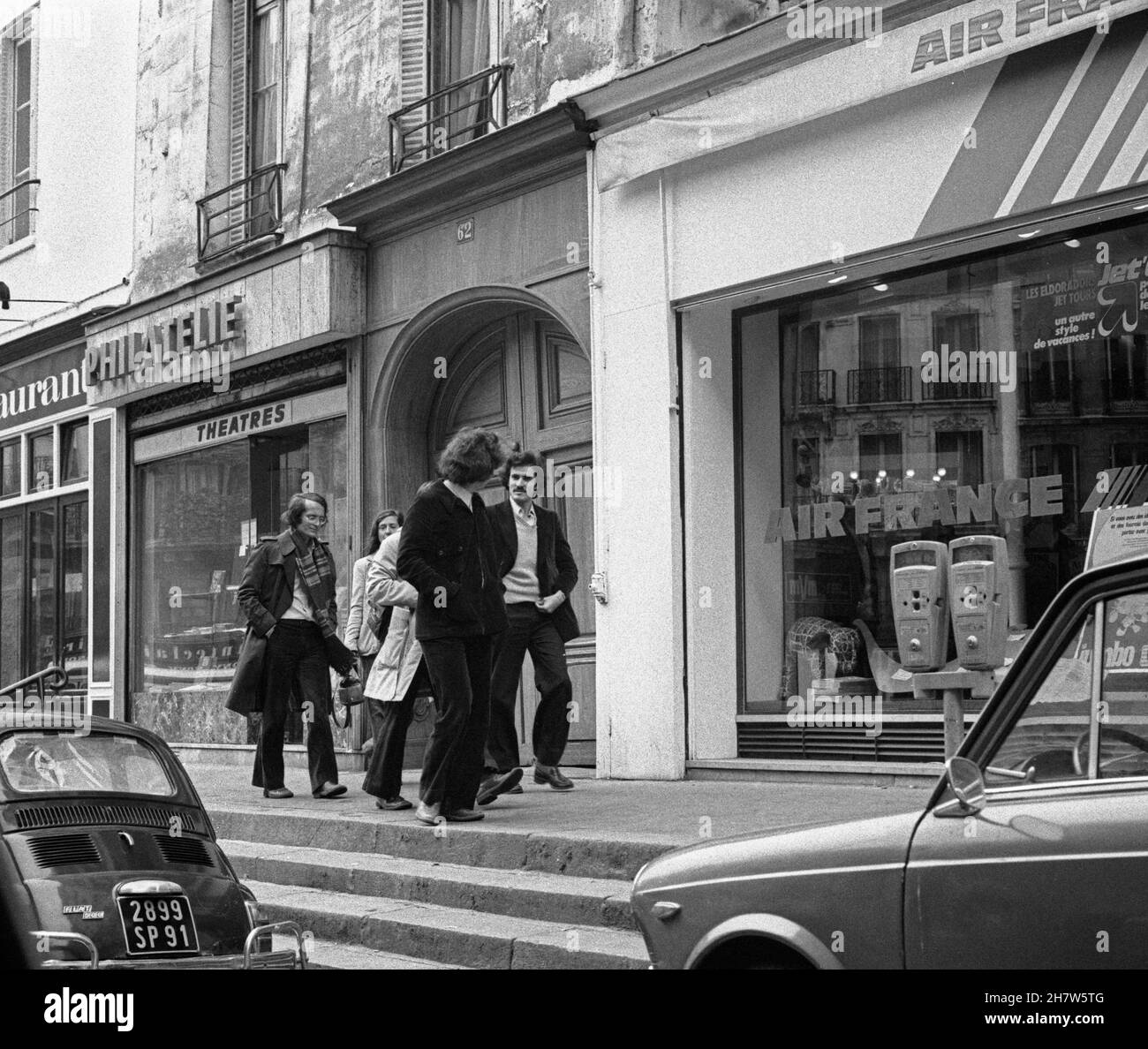 People are walking down the street, Paris; France, 1978 Stock Photo
