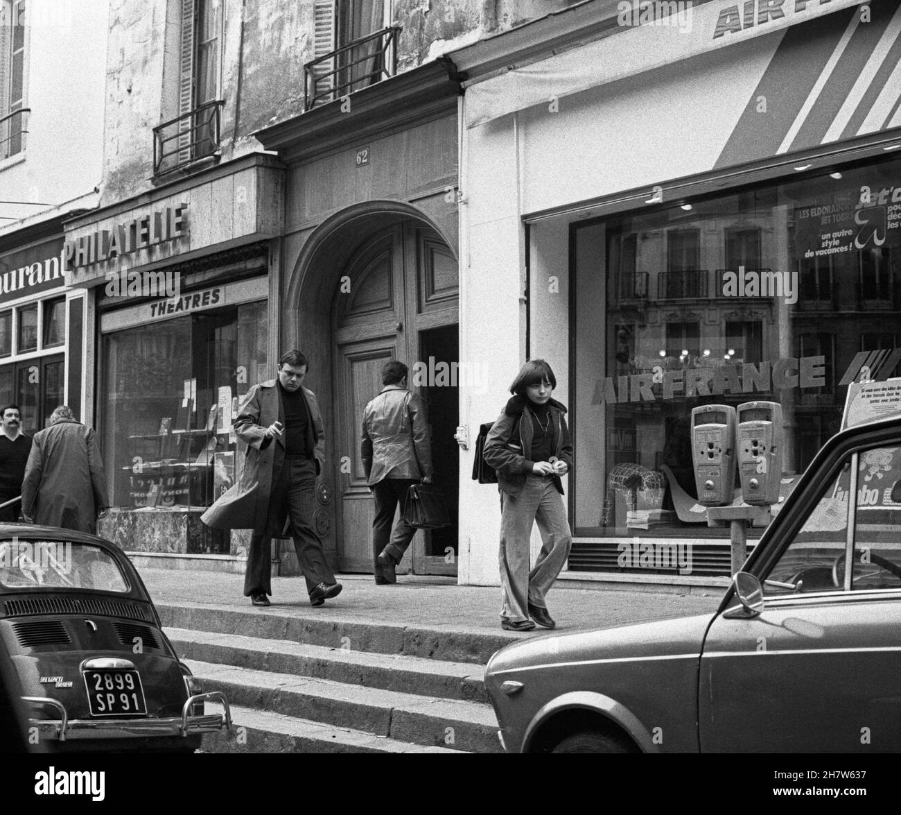 People are walking down the street, Paris; France, 1978 Stock Photo