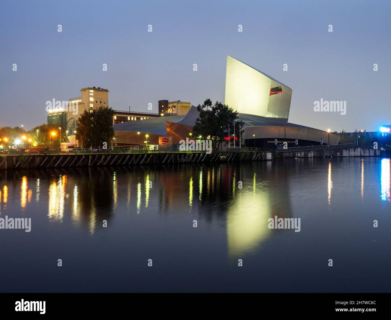 The Imperial War Museum North reflected in the Manchester Ship Canal at ...