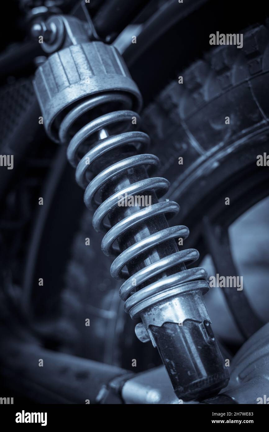 Close up of motorcycle shock absorber on back wheel Stock Photo - Alamy