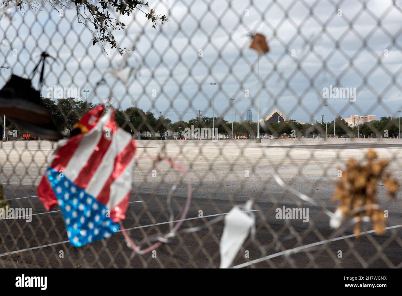 Houston, USA. 24th Nov, 2021. A memorial for the victims of Astroworld Festival is set up outside of NRG Park in Houston, Texas on November 24, 2021. Images of all ten victims line the fence. Most of the remnents from the festival have been deconstructed and taken down but the Mountain shaped stage Travis Scott performed on remains. (Photo by Jennifer Lake/Sipa USA) Credit: Sipa USA/Alamy Live News Stock Photo