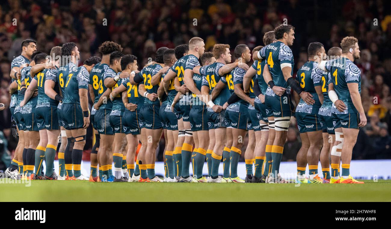 The Wallabies stand arm in arm as the national anthem plays prior to the kick off in Cardiff of the Autumn International test match between Australia and Wales. Stock Photo