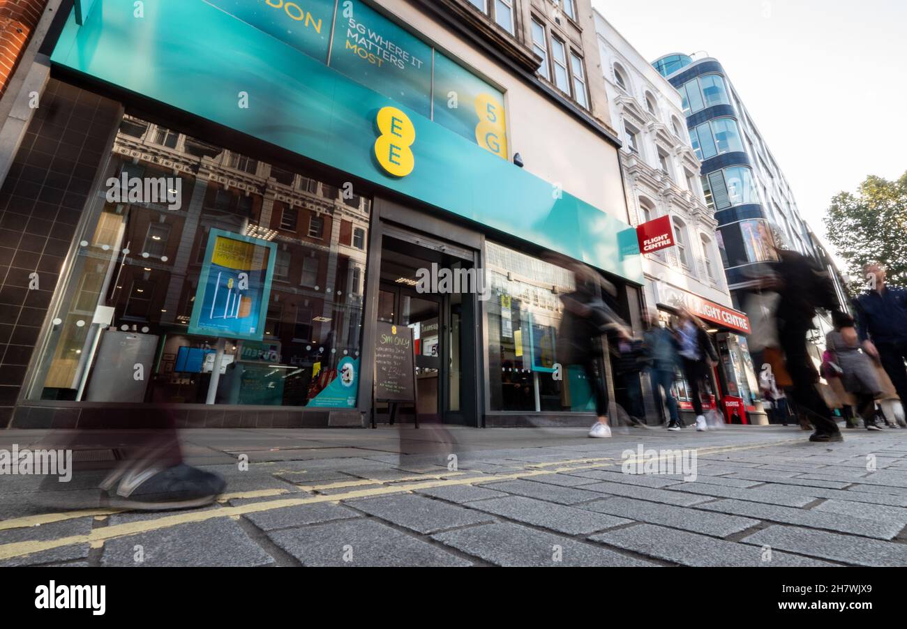 The EE Store, Oxford Street, London. Shoppers passing the UK high