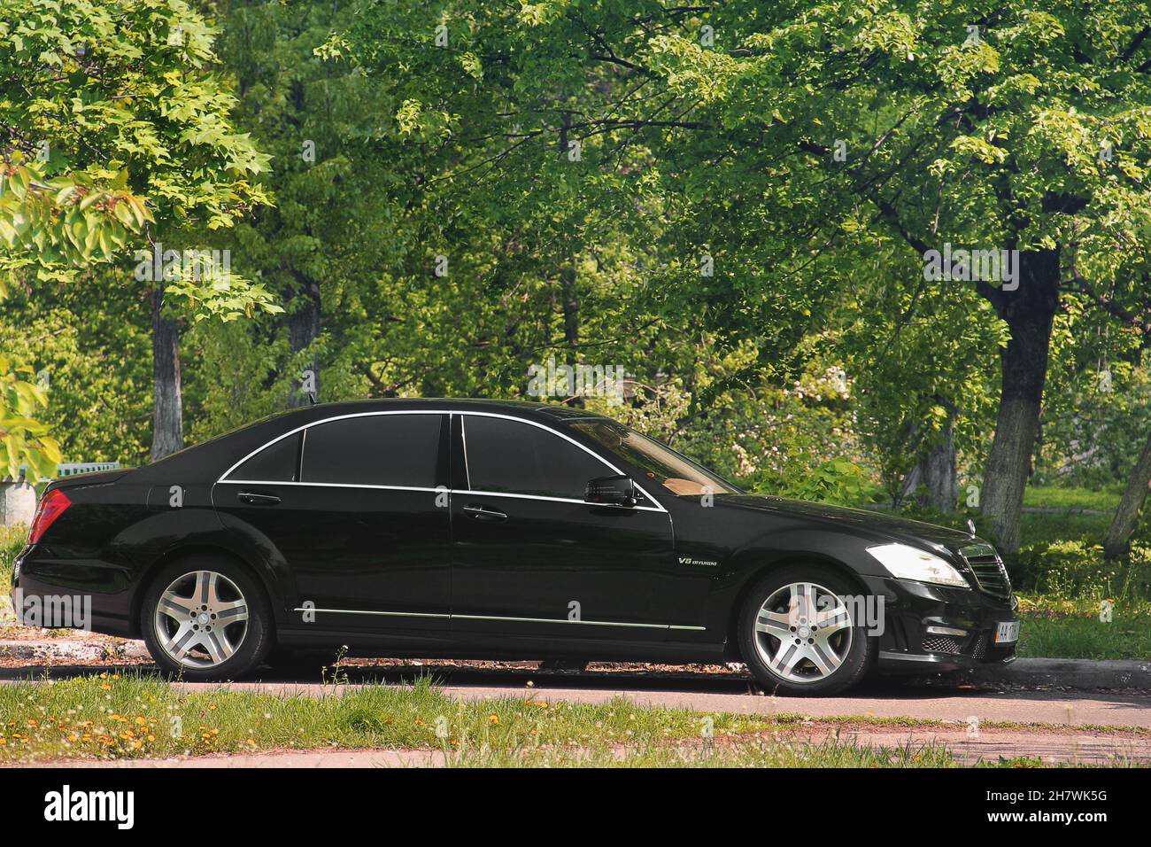 Kiev, Ukraine - May 3, 2019: Black Mercedes S Class W221 on a forest road Stock Photo