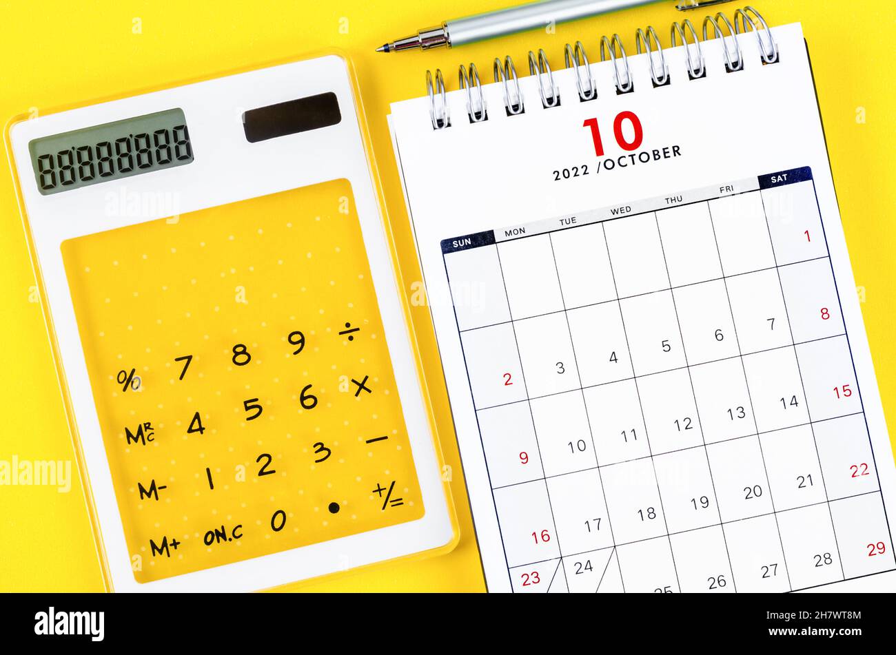 October 2022 Desktop Calendar The October 2022 Desk Calendar With Calculator And Pen On Yellow Background  Stock Photo - Alamy