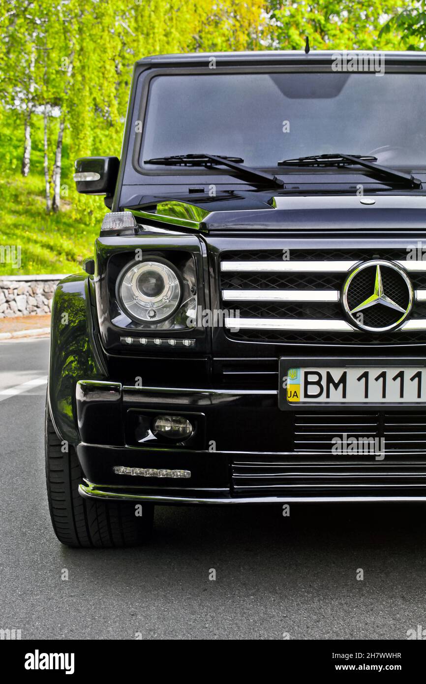 Kiev, Ukraine - April 27, 2014: Black Mercedes-Benz G500 AMG style on the road Stock Photo