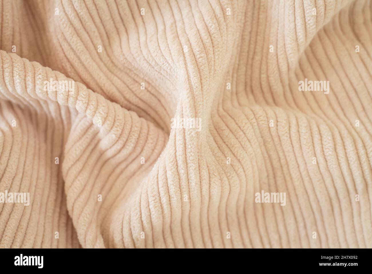 Ribbed beige corduroy or velvet texture background top view Stock Photo