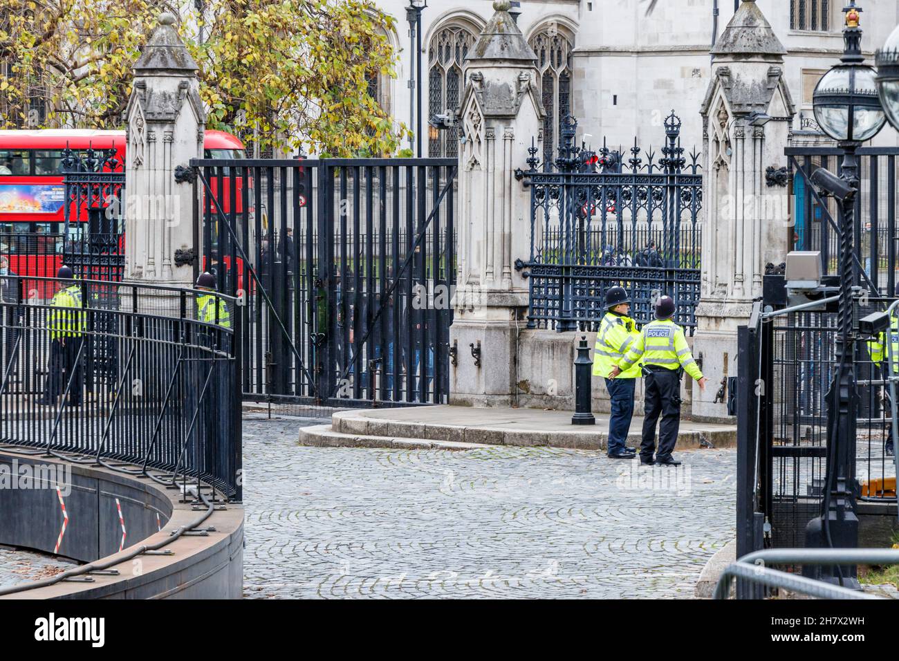 Police and security measures inside the grounds of the Palace of Westminster (Houses of Parliament), London, UK Stock Photo