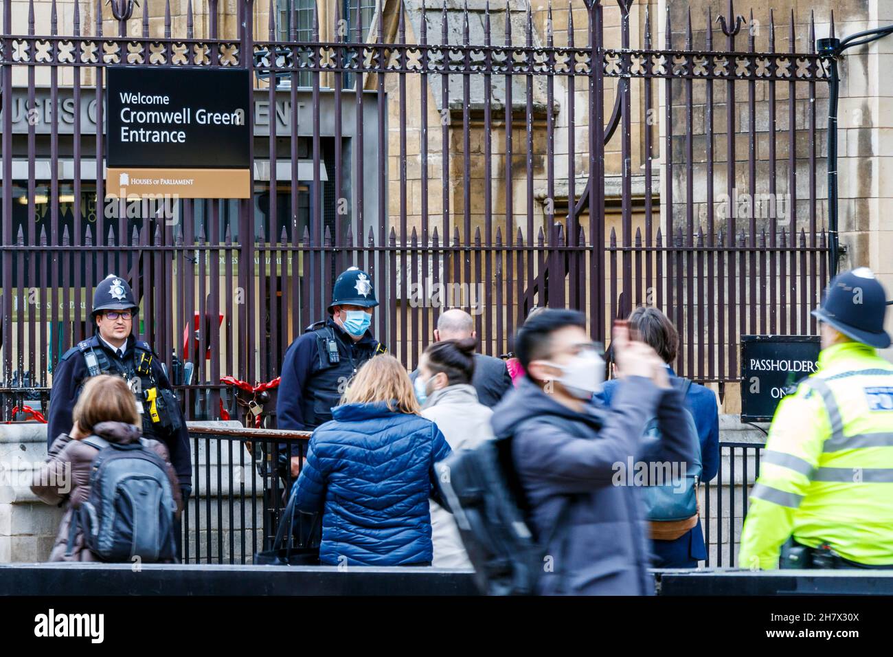 Tourists and police at the Cromwell Green entrance to the Palace of