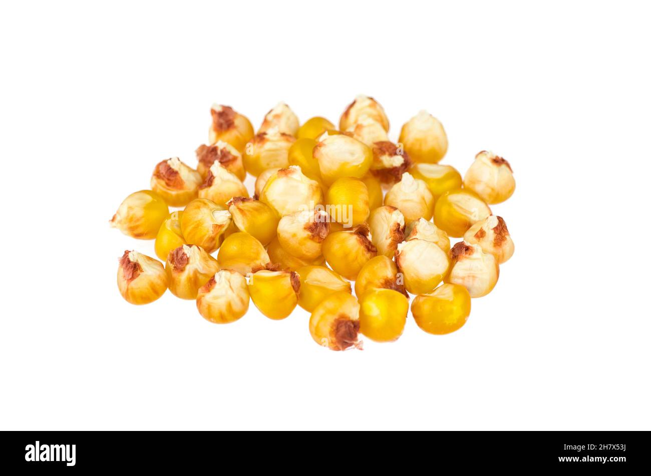 Dried corn kernels on white background Stock Photo