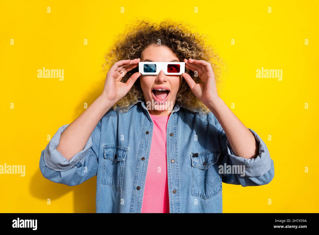 Photo of surprised lady imax movie special effects reaction wear 3d