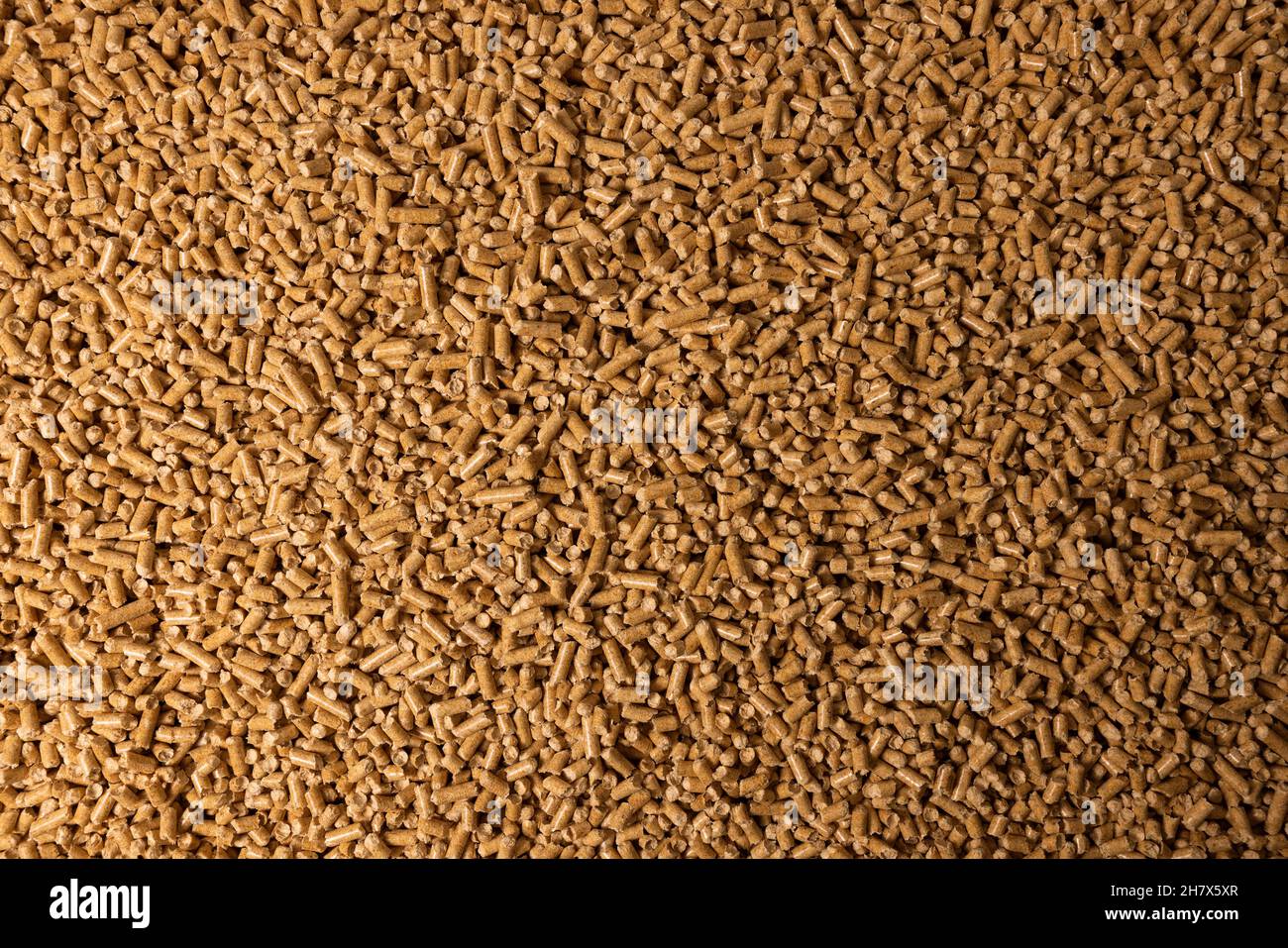 wood pellets background. biomass biofuel Stock Photo