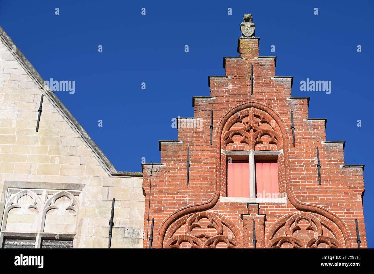 Medieval stepped gable in the old town of Bruges Stock Photo