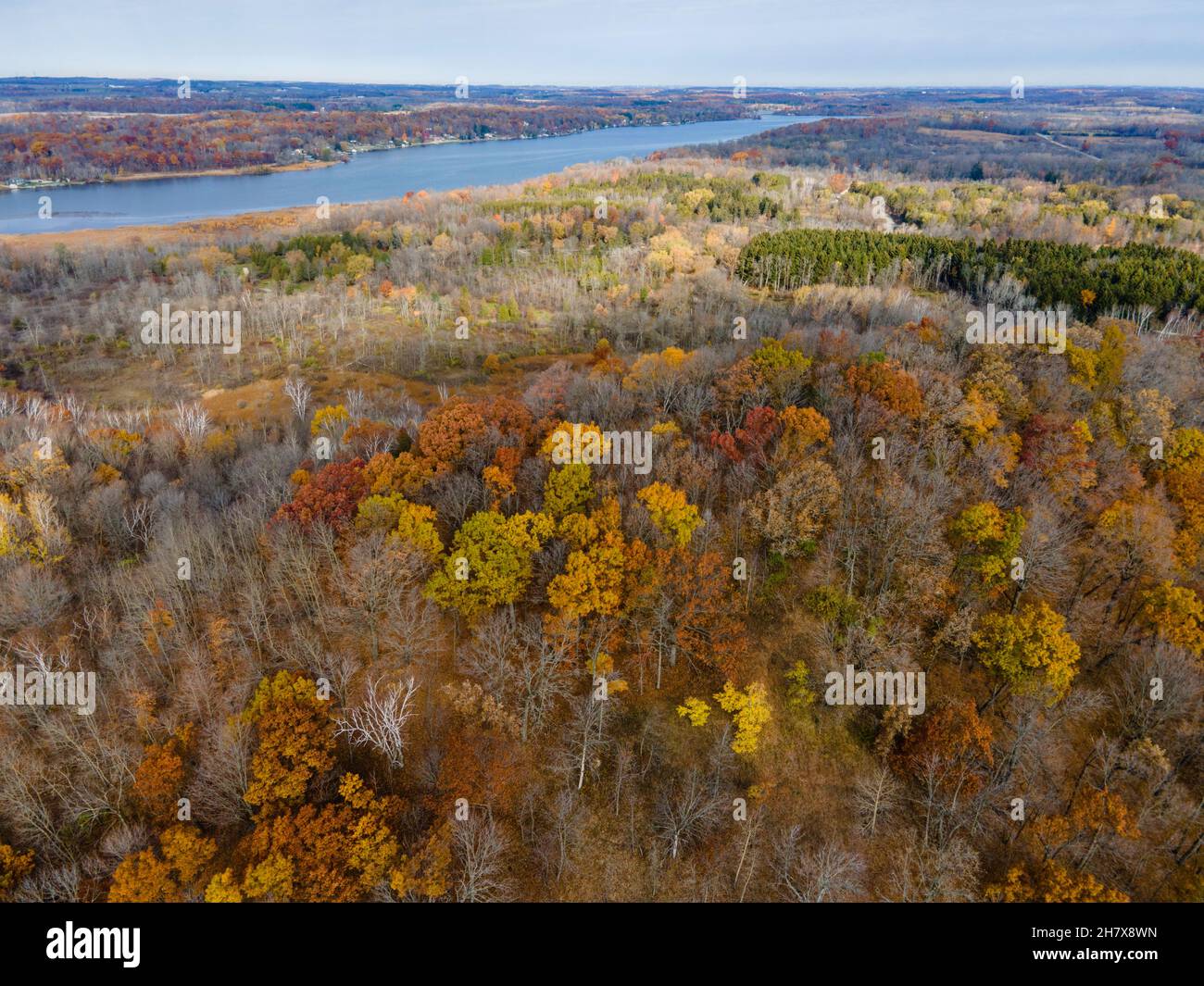 Aerial photograph of Dundee Mountain on an overcast autumn morning, with Long Lake in the distance. Dundee, Wisconsin, USA. Stock Photo