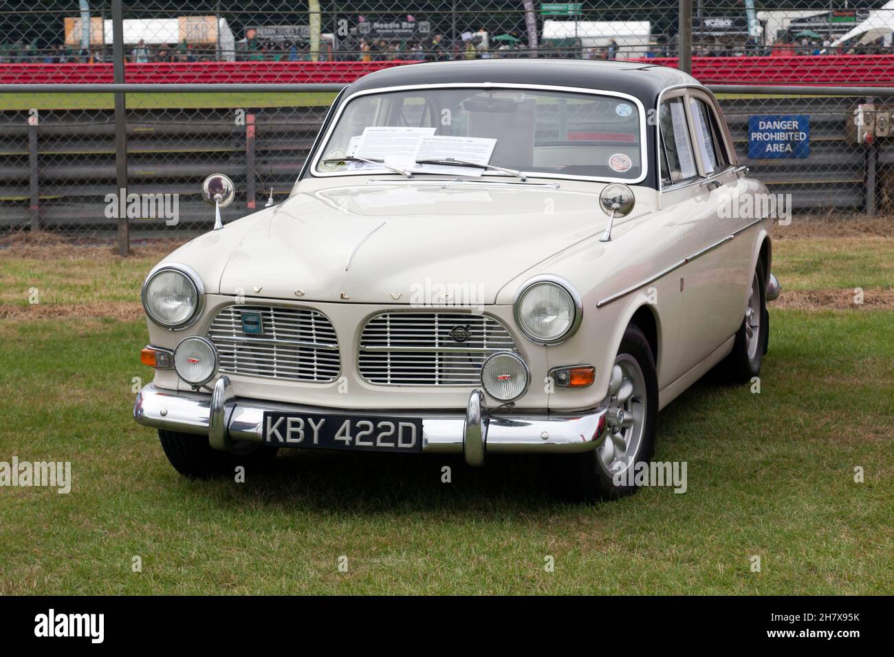 Three-quarters front view of a White, 1966, Volvo Amazon 122S, on display at the 2021 Silverstone Classic Stock Photo