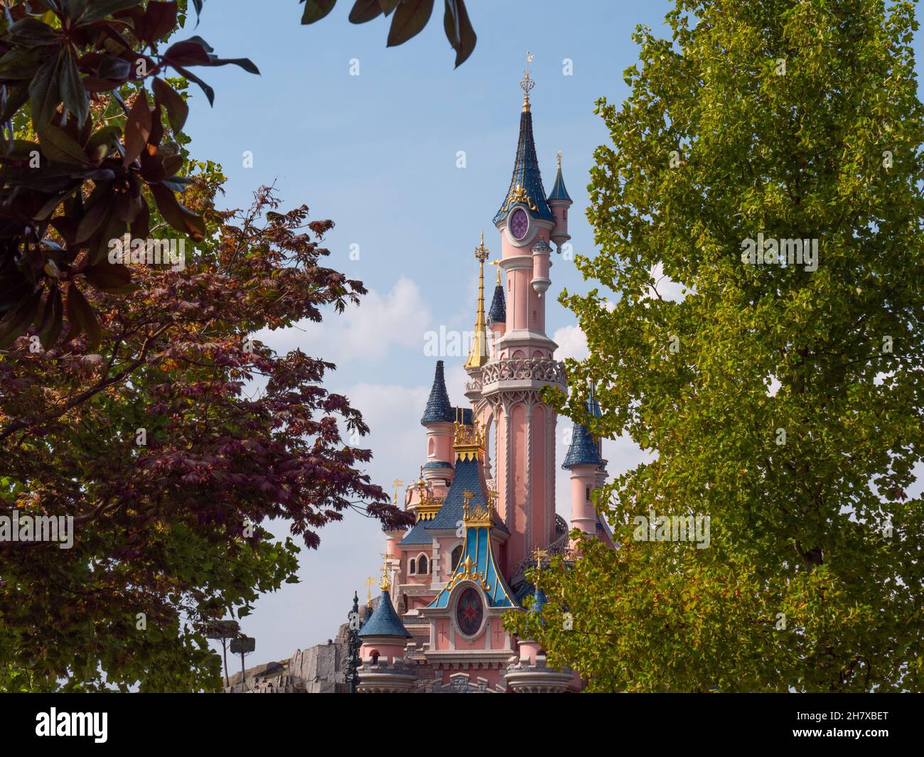 Paris, France; September 2019: Disney castle among the trees in the park Stock Photo