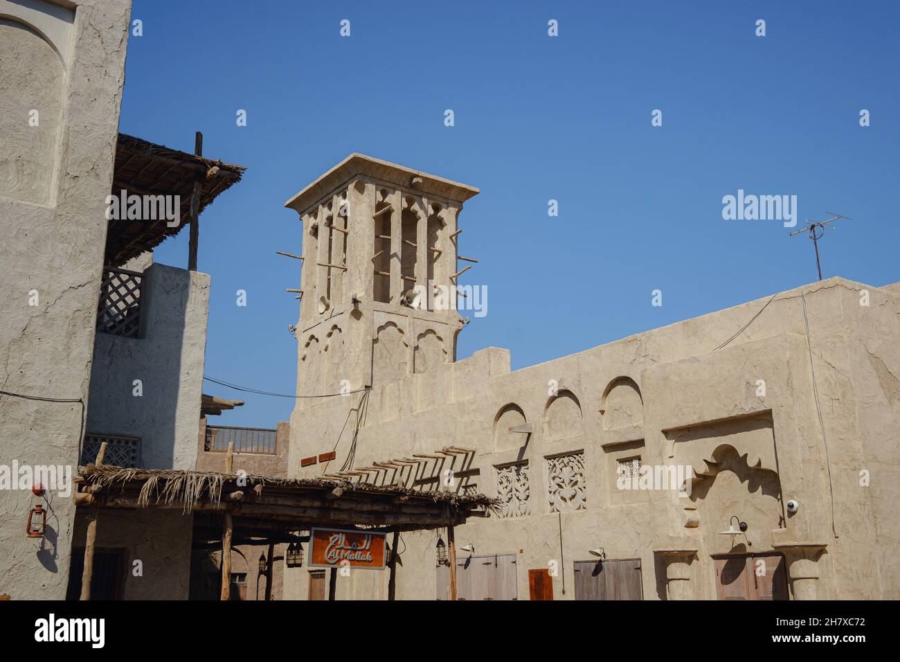 Dubai, UAE 17 February 2020: Old Dubai buildings and Arabian street. Historical Al Fahidi neighbourhood, Al Bastakiya. Heritage district in United Arab Emirates. details and general plans of old city. Stock Photo