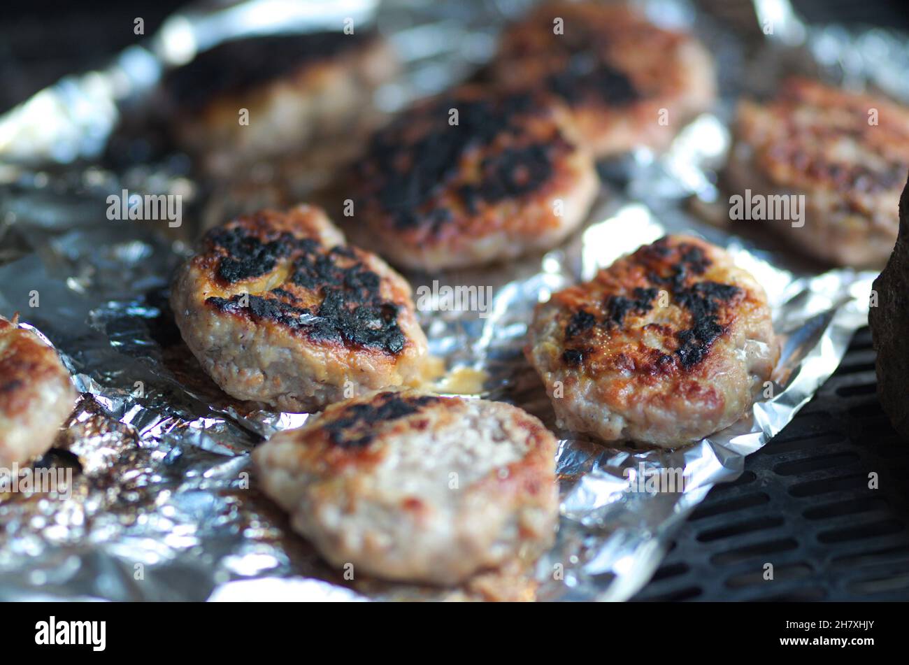 Grilled meatballs on grill, food theme Stock Photo Alamy