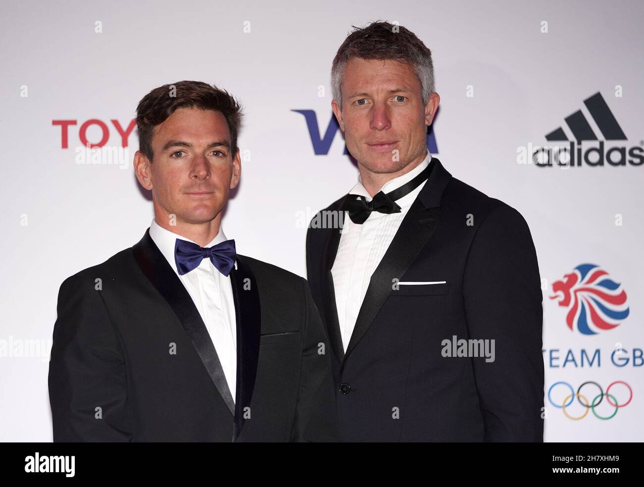 Sailing gold medalists Dylan Fletcher and Stuart Bithell arriving ahead of the Team GB Ball at Evolution London. Picture date: Thursday November 25, 2021. Stock Photo