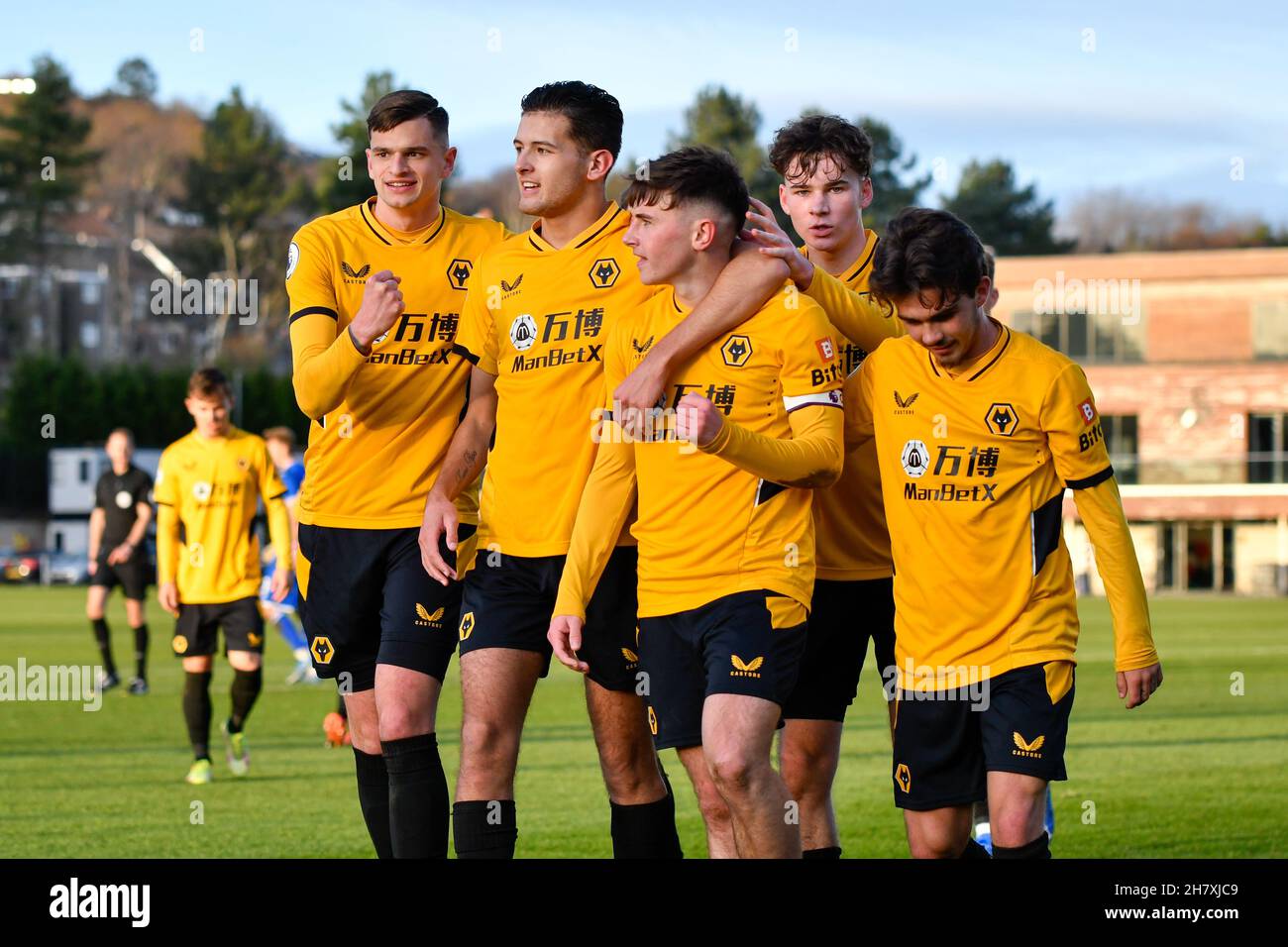 Swansea, UK. 25 November, 2021. The Wolves players celebrate their second goal during the Premier League Cup game between Swansea City Under 23s and Wolverhampton Wanderers Under 23s at the Swansea City Academy in Swansea, UK, UK on 25 November 2021. Credit: Duncan Thomas/Majestic Media. Credit: Majestic Media Ltd/Alamy Live News Stock Photo