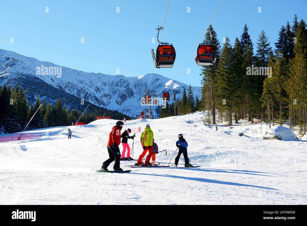 JASNA, SLOVAKIA - JANUARY 22:  The snowpark, skiers and cableway in Jasna Low Tatras. It is the largest ski resort in Slovakia with 49 km of pistes on Stock Photo