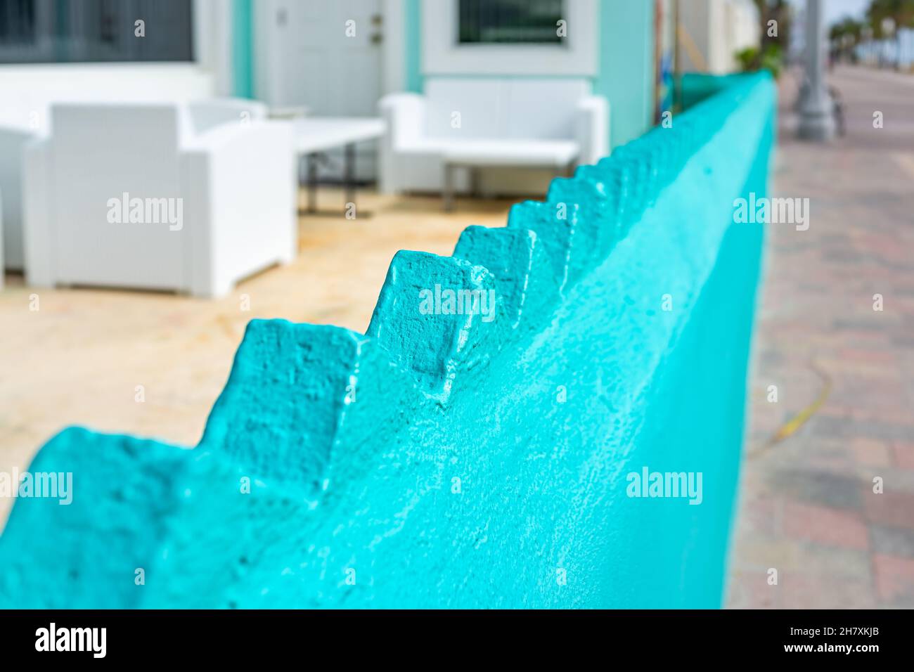 Hollywood, Miami Beach broadwalk in Florida and art deco colorful fence with turquoise green blue architecture retro vintage style spikes in apartment Stock Photo