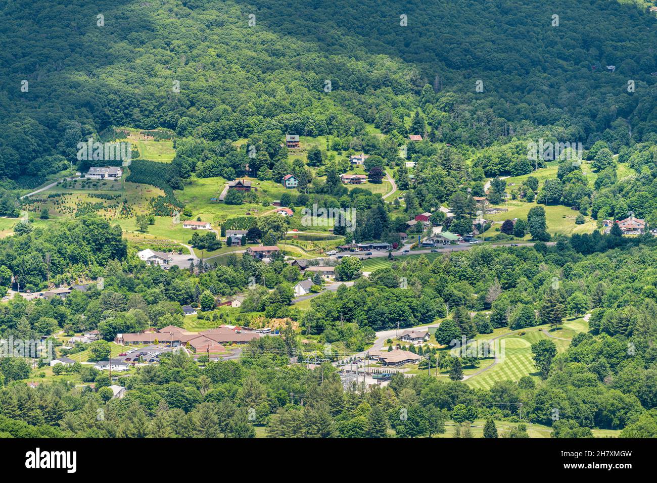 Cityscape high angle above view of Banner Elk town city in summer in
