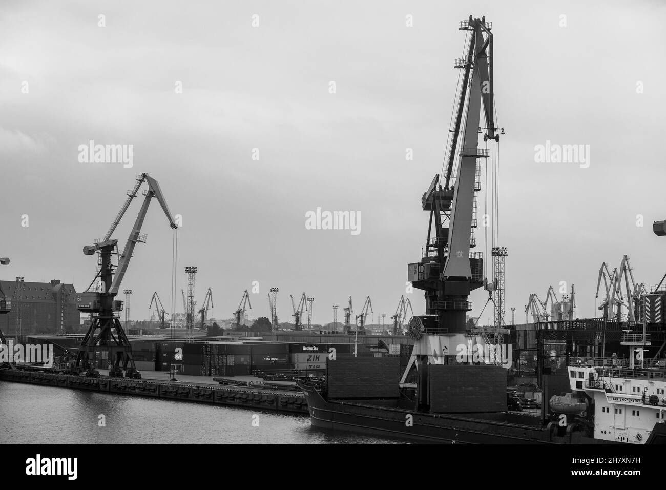 Harbor cargo cranes shipping port Black and White Stock Photos & Images ...