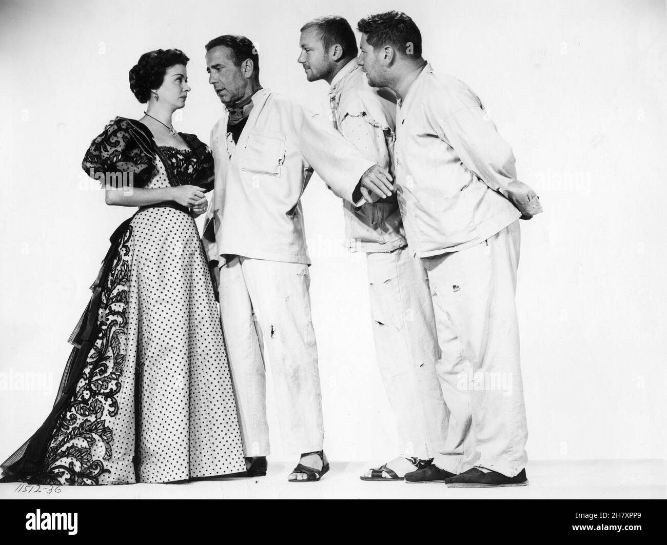JOAN BENNETT HUMPHREY BOGART ALDO RAY and PETER USTINOV publicity portrait in WE'RE NO ANGELS 1955 director MICHAEL CURTIZ play Albert Husson costume design Mary Grant Paramount Pictures Stock Photo