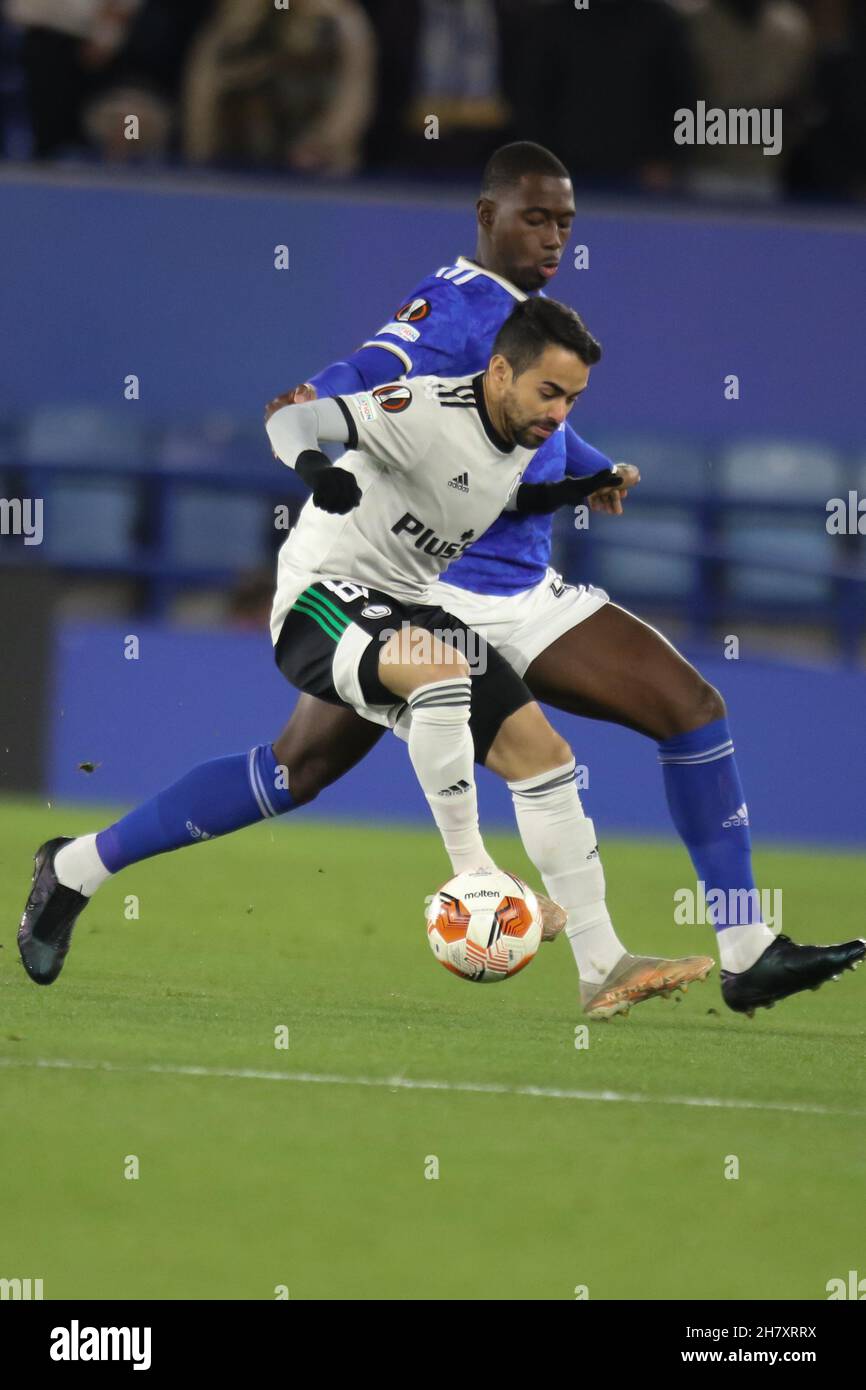 Leicester, UK. 25th Nov, 2021. Legia Warsaw midfielder Luquinhas (82) fights for the ball with Leicester City midfielder Boubakary Soumaré (42) during the UEFA Europa League group stage match between Leicester City and Legia Warsaw at the King Power Stadium, Leicester, England on 25 November 2021. Photo by Jurek Biegus. Editorial use only, license required for commercial use. No use in betting, games or a single club/league/player publications. Credit: UK Sports Pics Ltd/Alamy Live News Stock Photo