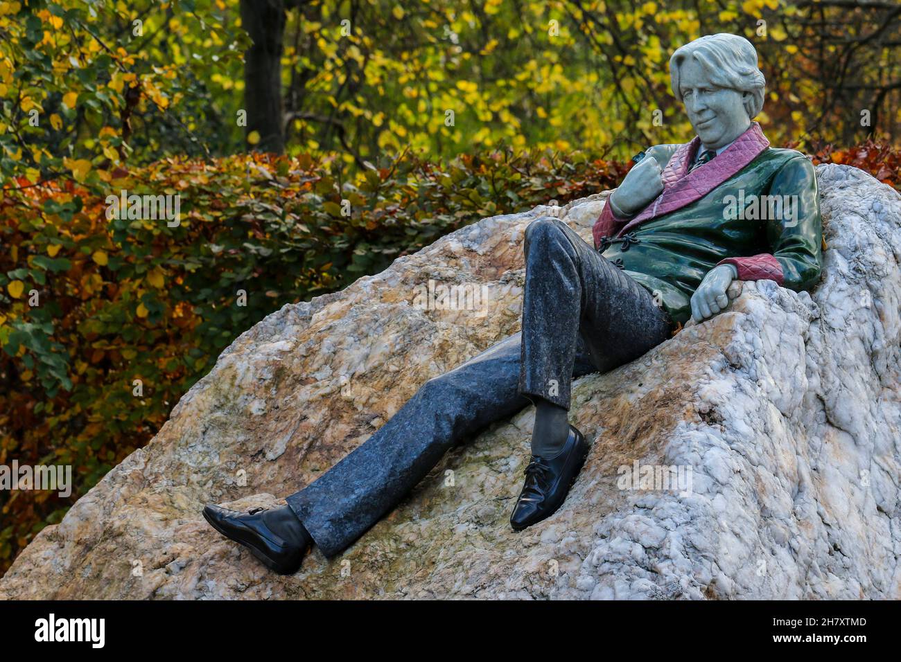 Statue of "Oscar Wilde" in Merrion Square Park. Famous Irish poet and playright. Dublin, Ireland