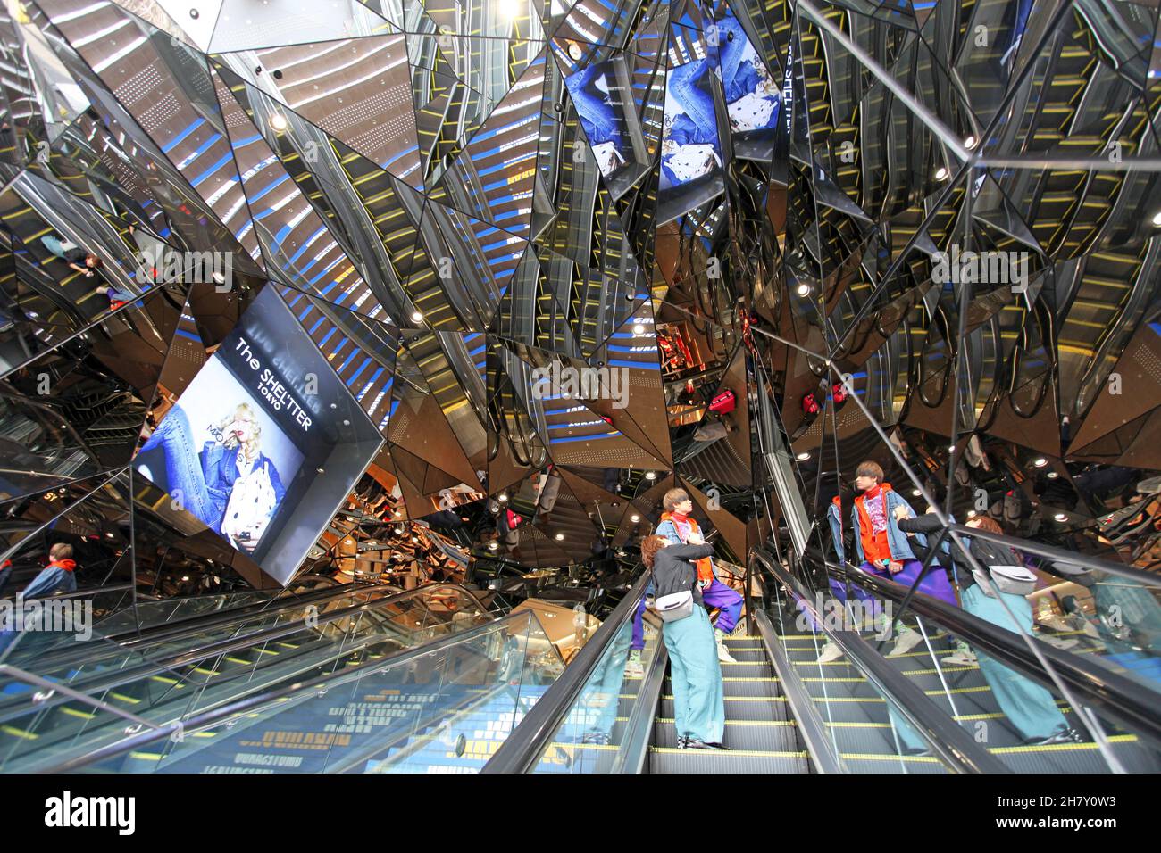 The entrance to the Tokyu Plaza Omotesando in Harajuku is covered with mirrors when ascending or descending the escalators in Tokyo, Japan. Stock Photo