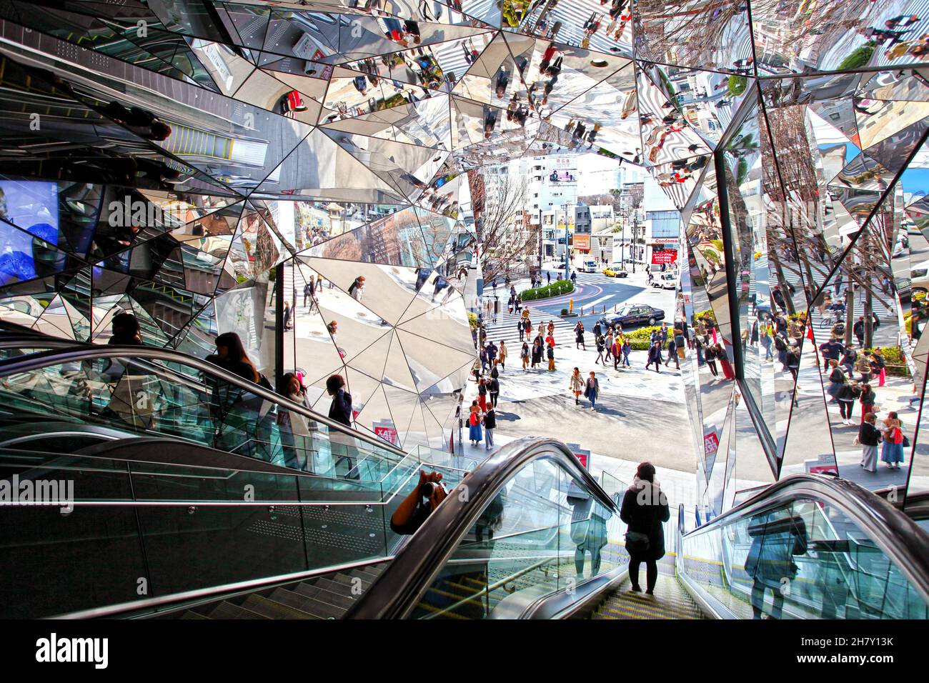 The entrance to the Tokyu Plaza Omotesando in Harajuku is covered with mirrors when ascending or descending the escalators in Tokyo, Japan. Stock Photo