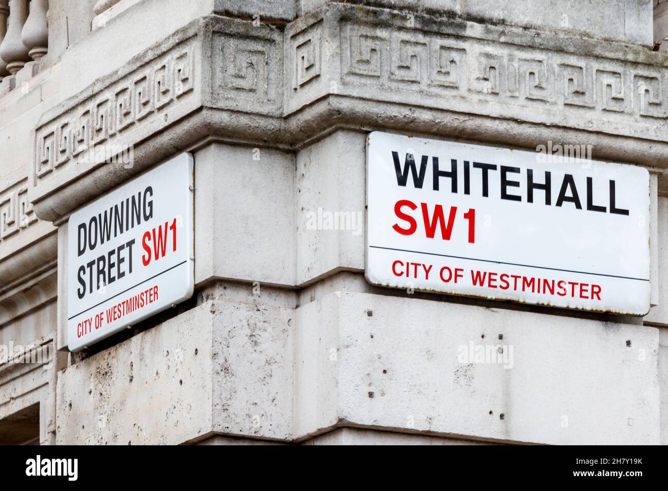 Street signs on the corner of Downing Street and Whitehall, London, UK Stock Photo