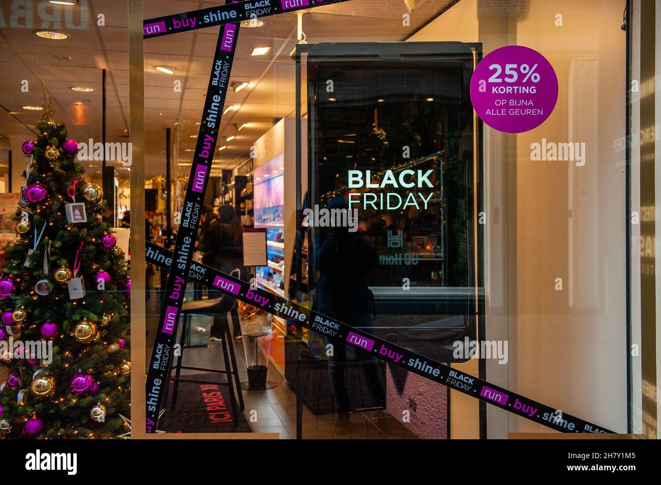 Amsterdam, Netherlands. 25th Nov, 2021. The store ICI PARIS XL is seen  decorated with a digital screen in Kavelstraat ahead of Black Friday with  the shopping centre looking emptier compared to other